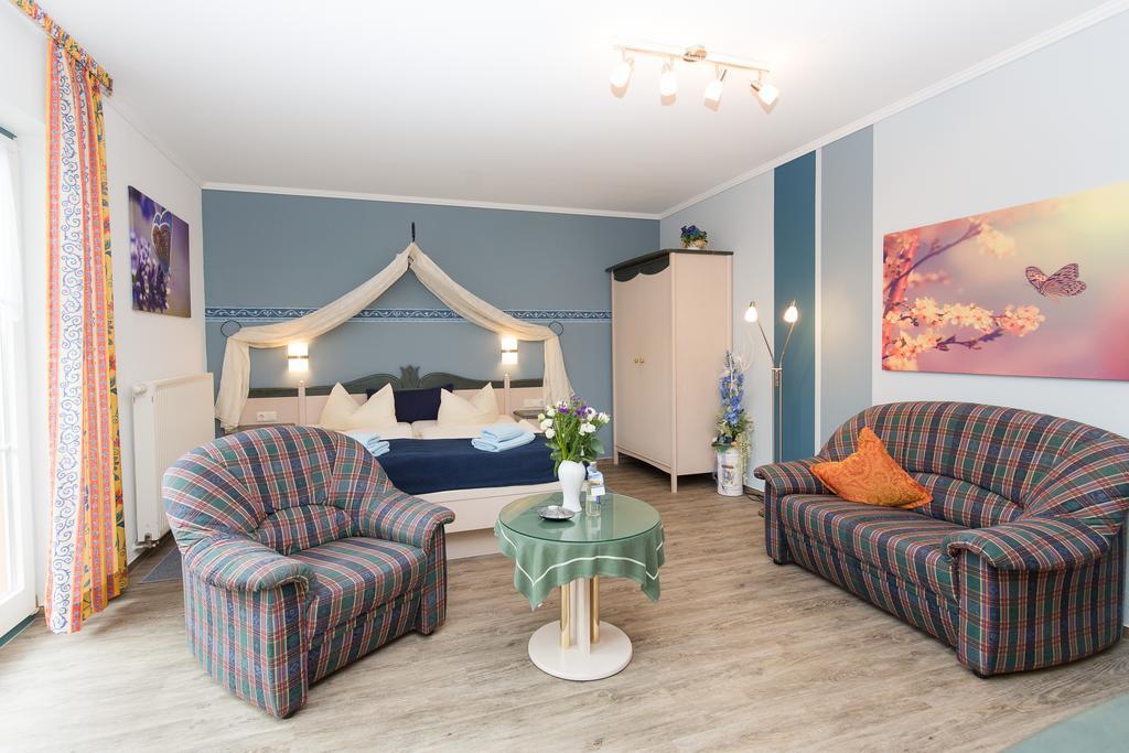 Hotel Garni Am Deich Zingst Quarto foto