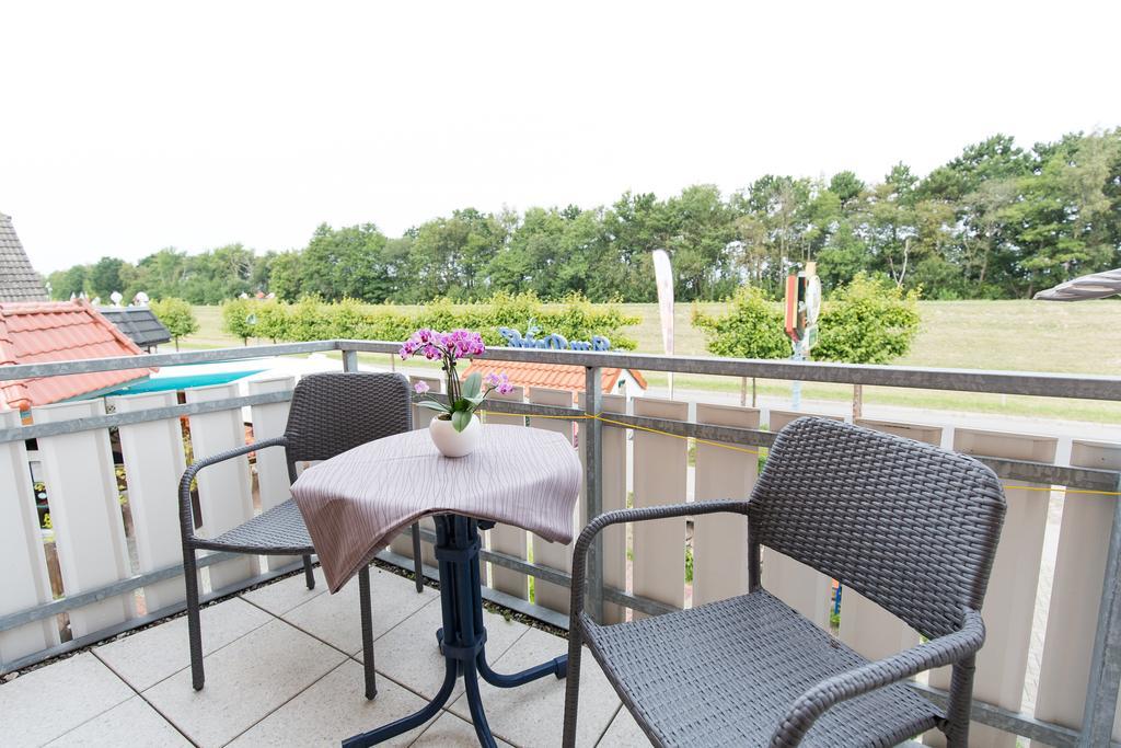 Hotel Garni Am Deich Zingst Quarto foto