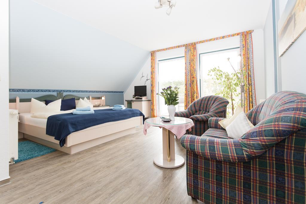 Hotel Garni Am Deich Zingst Quarto foto