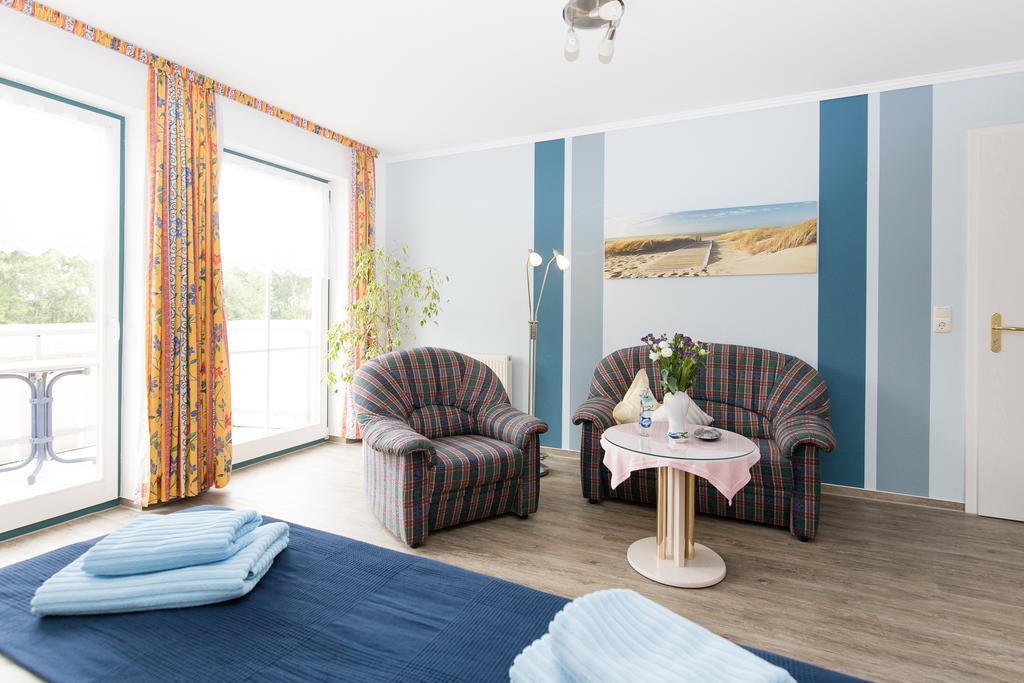 Hotel Garni Am Deich Zingst Quarto foto