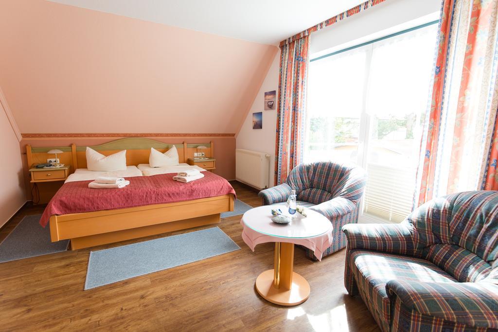 Hotel Garni Am Deich Zingst Quarto foto